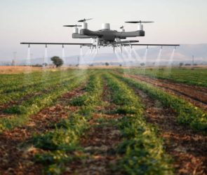 Drone spraying a field