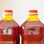 2 Bottles of Red palm oil used for frying