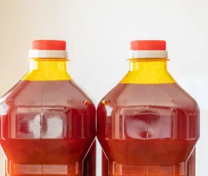 2 Bottles of Red palm oil used for frying