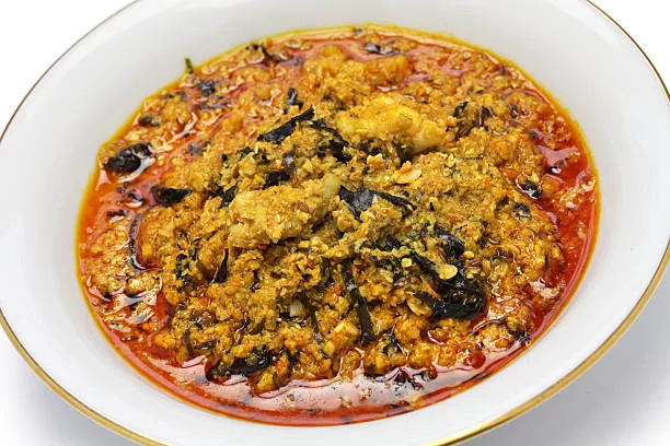 egusi soup, nigerian cuisine isolated on white background